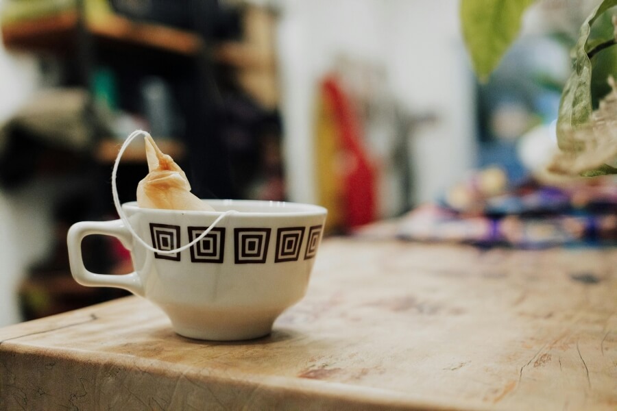 Consumers enjoying single-serve coffee and tea bags for on-the-go convenience – Easy brewing, anytime, anywhere.