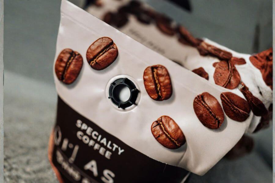Close up of coffee bag degassing valve used in specialty coffee packaging to release carbon dioxide and preserve freshness